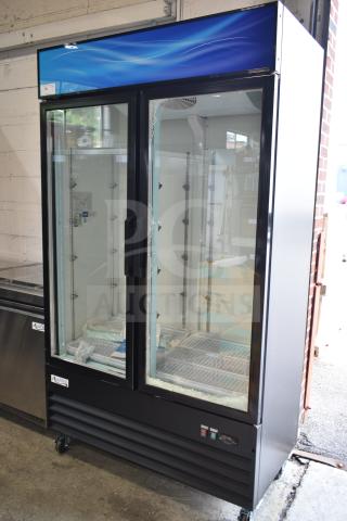 Brand new Avantco 178GDC40HCB 2-door cooler on casters, 115V. Glass damage noted. Commercial merchandising unit.
