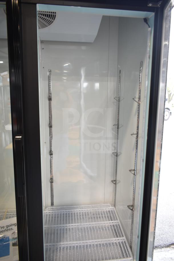 Brand new Avantco 178GDC40HCB 2-door cooler merchandiser, on casters, 115V. Note: visible glass damage.