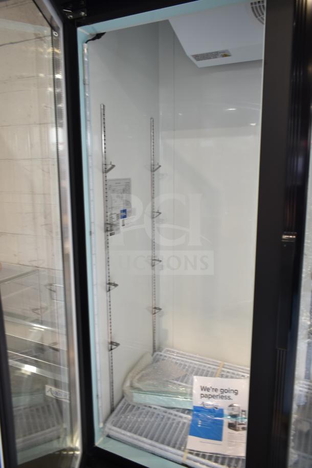 Avantco 178GDC40HCB commercial cooler with 2 doors, commercial casters. New condition, visible glass damage. 115V, 1 phase.
