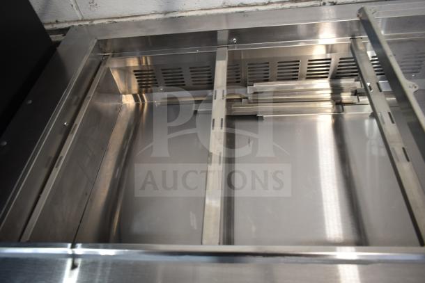 Brand new 2025 Avantco 178SSCFT60HC 60" stainless steel refrigerated salad bar, scratch and dent, on commercial casters.