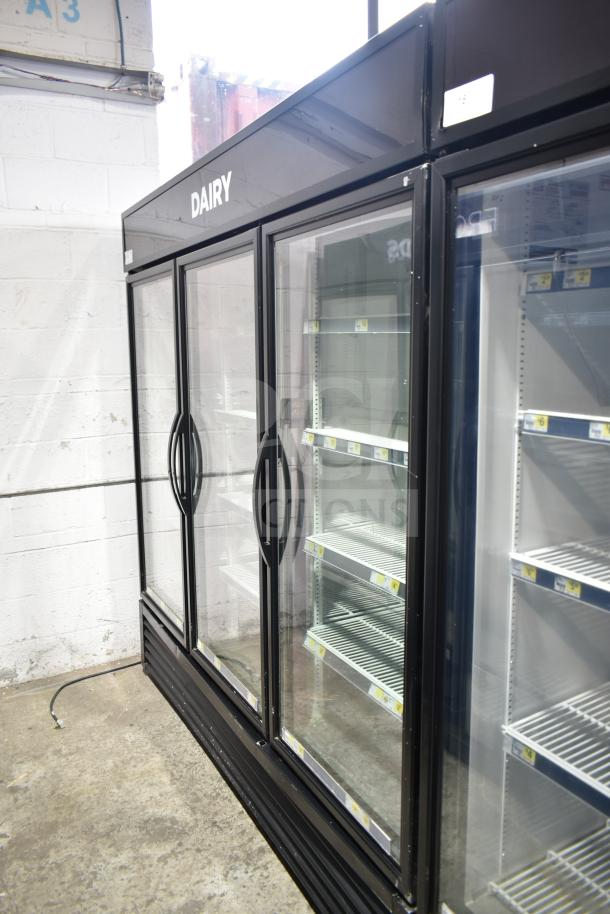 2017 True GDM-72-HC 3-door reach-in cooler merchandiser, 115V, 1 phase, tested and working, "Dairy" label displayed.