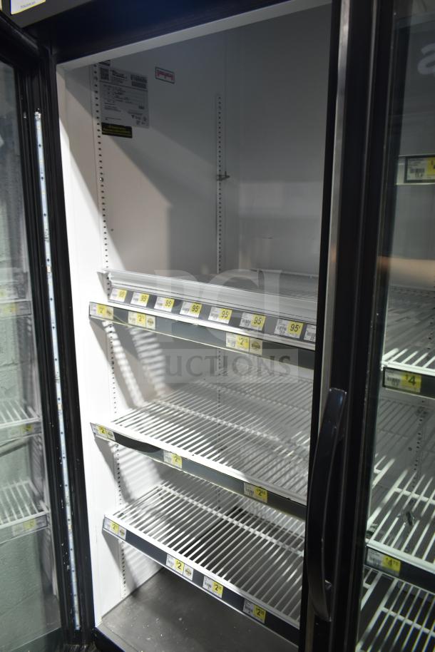 2017 True GDM-72-HC 3-door cooler merchandiser, tested, working, with labels, 115V, 1 phase, clean interior shelves.