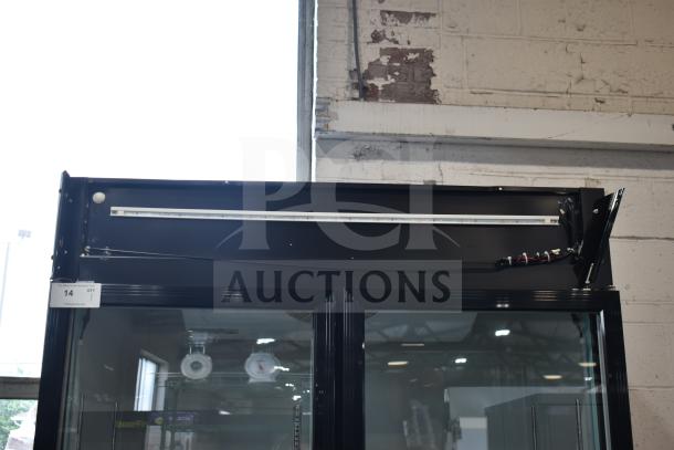 Brand new 2025 Avantco 178GDC40HCB 2-door reach-in cooler, scratch and dent condition, on commercial casters.