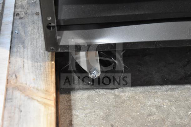 Brand new Avantco 178GDC40HCB cooler caster. Black and silver, durable for easy mobility on commercial floors.