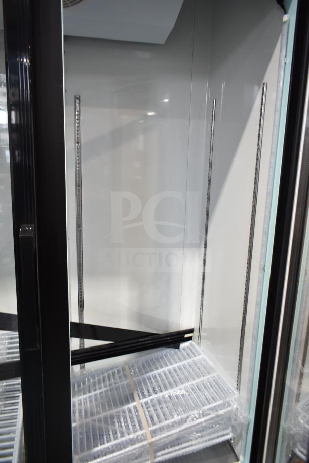 Brand new Avantco 178GDC40HCB commercial reach-in cooler, two doors, on casters, 115V, minor cosmetic defects.