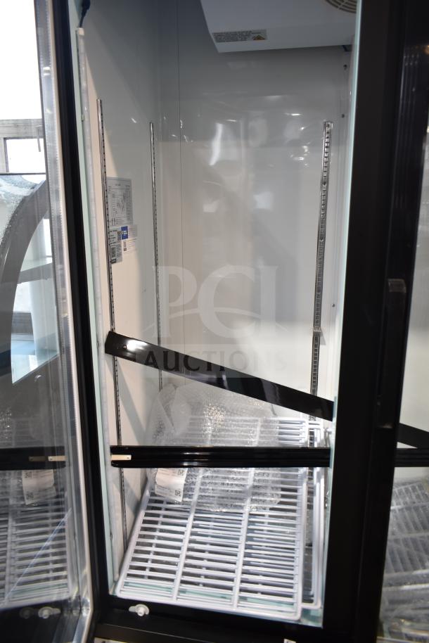 Brand new Avantco 178GDC40HCB cooler merchandiser, 2 doors, scratch and dent, commercial casters, 115V, 1 phase.