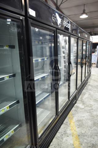 2017 True GDM-72F-HC freezer, three glass doors, black frame, working condition, shelves, commercial use.