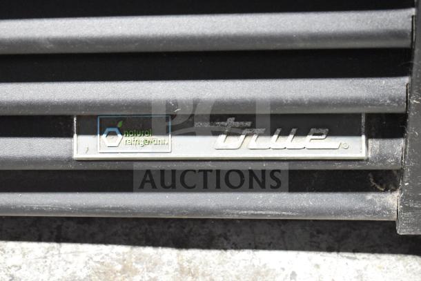 True GDM-72F-HC freezer grill with "natural refrigerant" label, indicating eco-friendly cooling use.