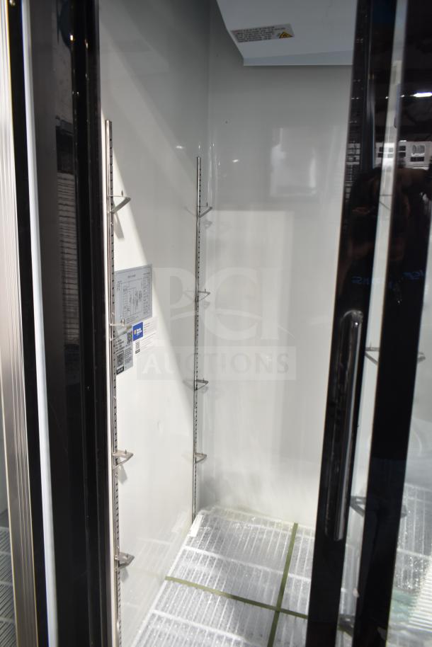 Brand new Avantco 178GDS33HCB 40" black sliding glass door merchandiser refrigerator with LED lighting, 115V, 1 phase.