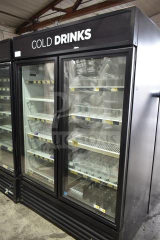 2017 True GDM-49-HC 2-door commercial cooler, black frame, glass doors, "Cold Drinks" label, tested and working.