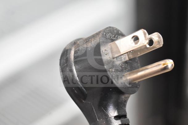 Close-up of the power plug from a 2020 True GDM-49-HC Commercial Cooler Merchandiser. 115 Volts, 1 Phase.