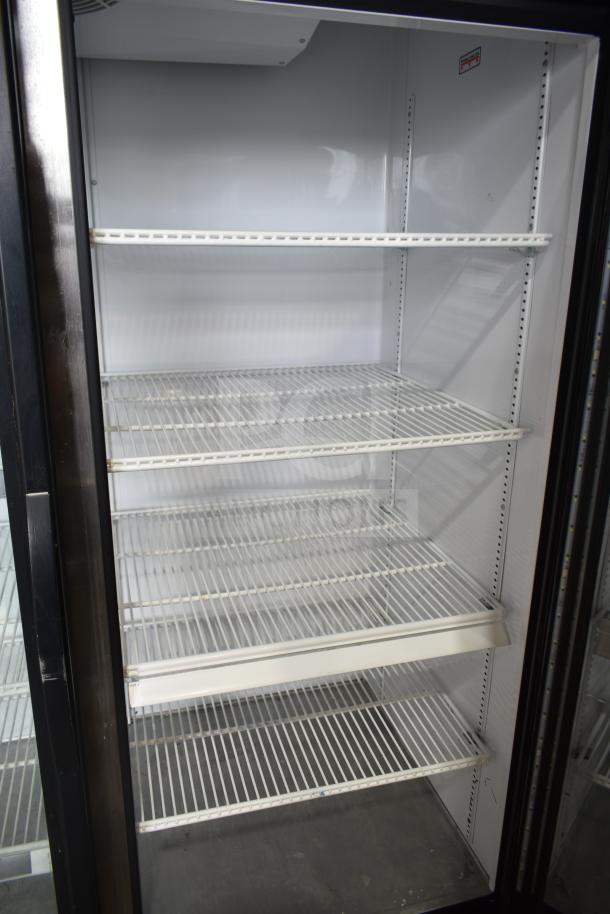 2020 True GDM-49-HC 2 Door Reach-In Cooler, 115V, tested working, clean interior with adjustable shelves.