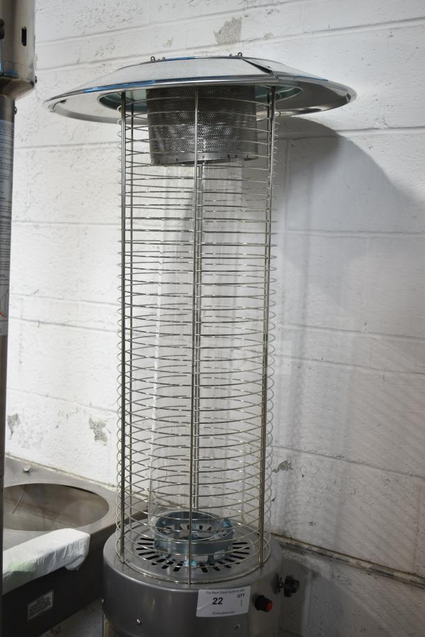 Brand new scratch and dent Backyard Pro RNDFHSTL steel round portable propane patio heater with glass tube, 46,000 BTU.