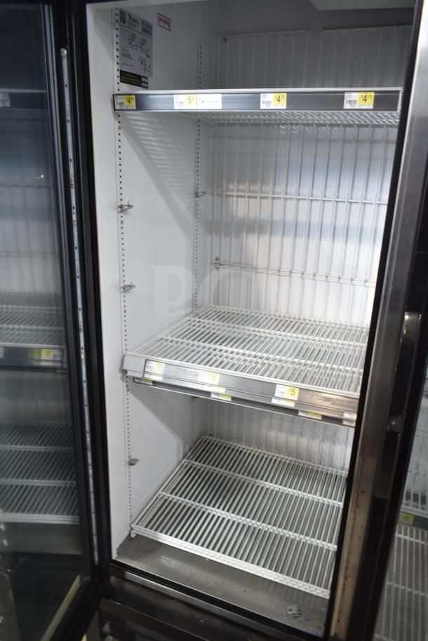 2017 True GDM-72F-HC commercial 3 door freezer merchandiser with shelves, tested and working, 115/208-230V, 1 phase.