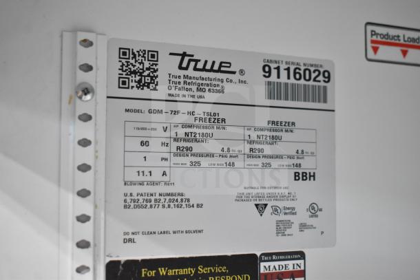 True GDM-72F-HC freezer label showing model, voltage 115/208-230V, refrigerant R290, and serial number 9116029. Made in USA.