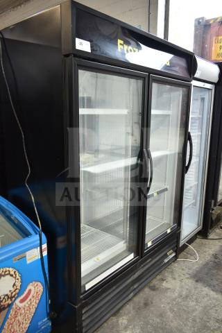 2021 True GDM-49F-HC commercial freezer, two glass doors, black, tested and working, 115/208-230 volts, 1 phase.