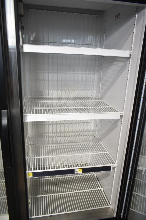 2021 True GDM-49F-HC Commercial Freezer, 2-door, tested, shelves visible, 115/208-230V, 1 Phase, excellent condition.