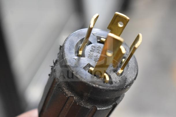 Plug close-up from the 2021 True GDM-49F-HC Commercial 2 Door Reach In Freezer. Tested and working condition.