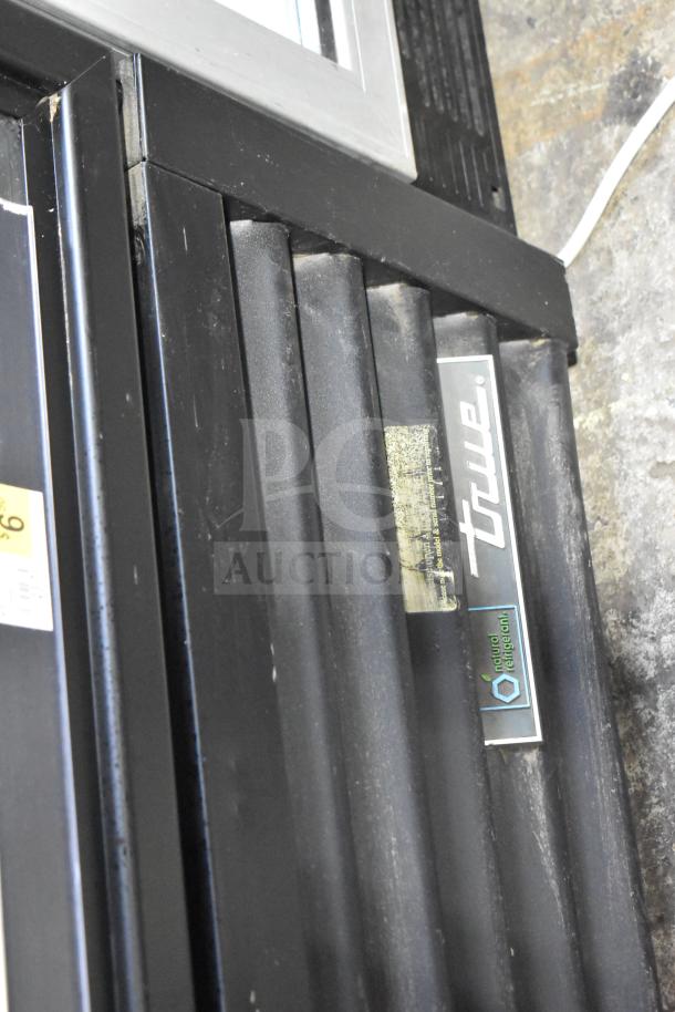 2021 True GDM-49F-HC Commercial Freezer, dual door, tested, with visible True logo and natural refrigerant label.