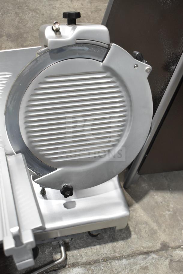 Brand new Estella 348SLM13 13" heavy-duty manual meat slicer with blade sharpener. Features 1/2 hp motor and scratch and dent condition.