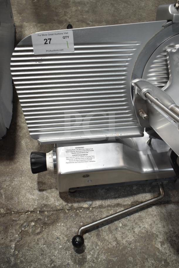 Estella 348SLM13 13" manual meat slicer, brand new with scratch and dent. Includes blade sharpener, 1/2 hp motor.