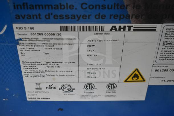 AHT RIO S 100 Commercial Ice Cream Freezer tag; shows model, voltage (110-120V), refrigerant type (R290/2,12 oz).