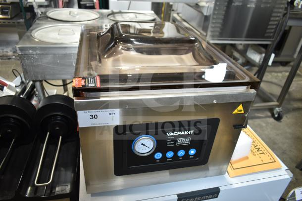 Brand new VacPak-It 186VMC16 chamber vacuum packaging machine with a 16" seal bar, oil pump, and digital display.