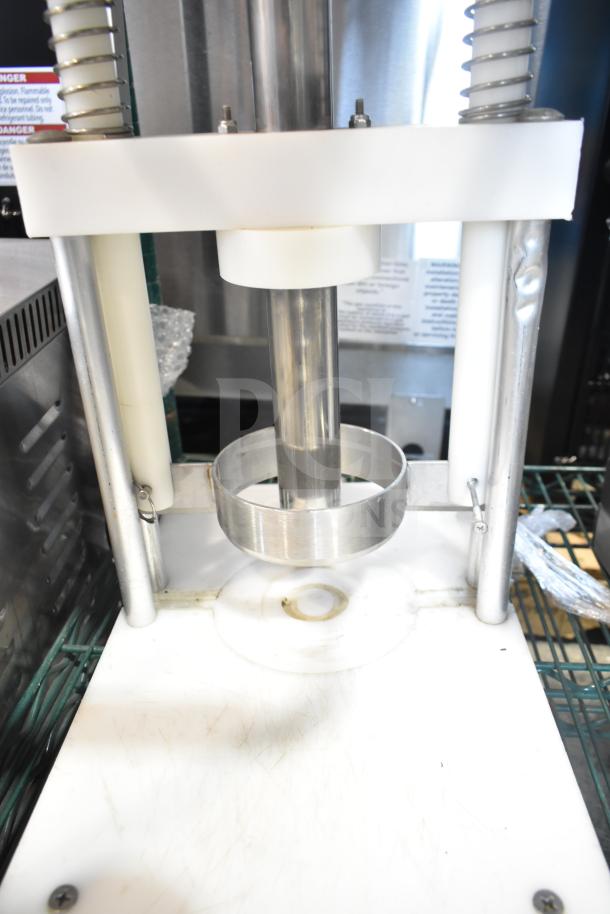 Countertop Pineapple Corer with stainless steel blade and sturdy base. Good condition, ideal for commercial use.