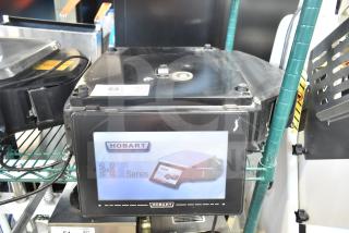 2017 Hobart HTi-7LH26 commercial food portioning scale, tested and working, dual voltage, visible wear, model markings displayed.