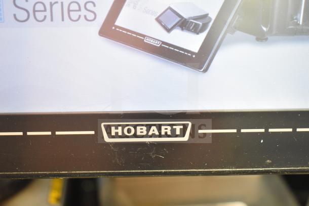 2017 Hobart HTi-7LH26 food portioning scale with display. Tested, working, 120/208-240V, 1 Phase. Hobart branding visible.