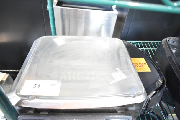 2017 Hobart HTi-7LH26 commercial countertop scale, tested and working, 120/208-240V, 1 phase. Silver with labeled markings.