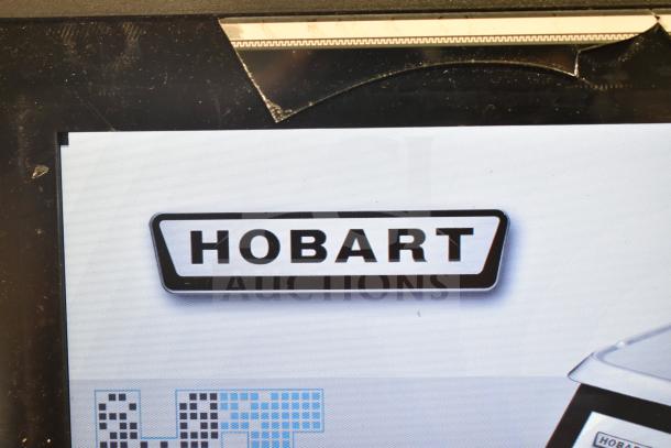 2017 Hobart HTi-7LH26 commercial scale, tested and working, 120/208-240V, 1 phase. Features logo and model details.