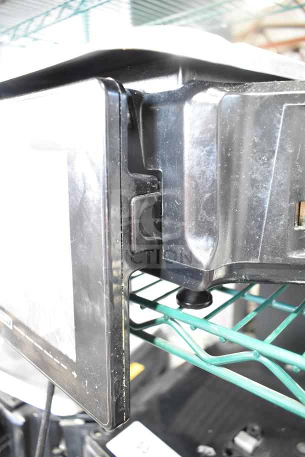 2016 Hobart HTi-7LH26 food portioning scale, black, visible screen damage, no power cord, tested and working condition.