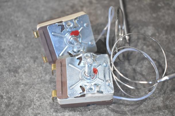 3 new scratch and dent items: Vollrath XCBL9003 waffle grate and 2 Avantco 177DPO1814 thermostats, shown on a gray surface.