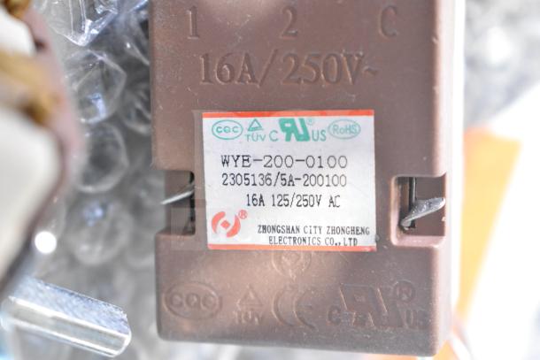 3 new scratch and dent items including a Vollrath waffle grate and two Avantco thermostats. Labels show 16A/250V specs.