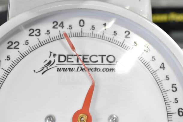 Detecto T25BN scale with clear display and red pointer, showing measurements from 22 to 25 units.