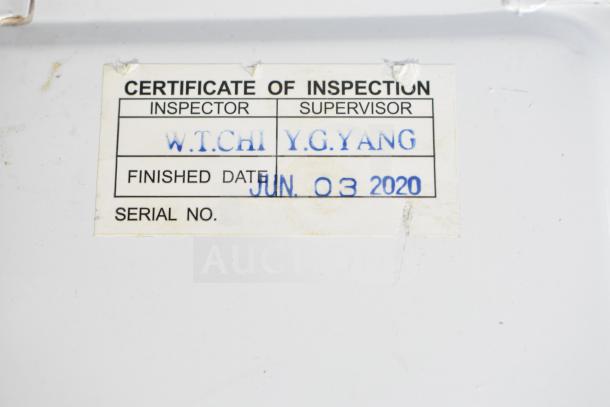Certificate of inspection label for scale, shows inspectors W.T. Chi and Y.G. Yang, finished date June 3, 2020.