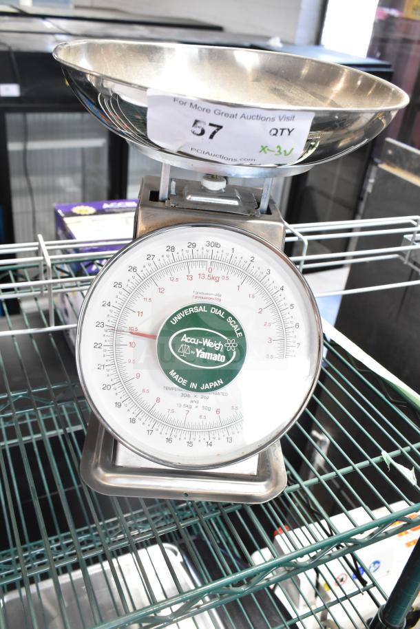 Accu-Weigh Yamato scale with stainless steel bowl on a white rack; branded "Made in Japan."