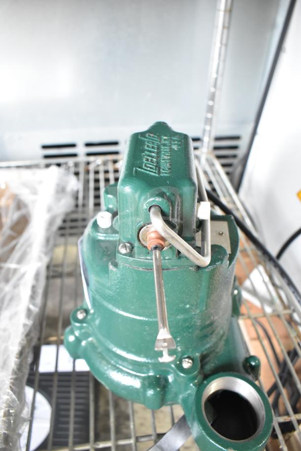 Brand new Zoeller 63-0001 Premium M63 sump pump, 115V, 1 phase. Green finish, visible minor scratches and dents.