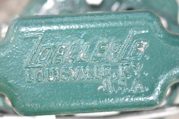 BRAND NEW Zoeller 63-0001 M63 Sump Pump, 115V, 1 Phase, green with "Zoeller Co. Louisville, KY, U.S.A." marking.