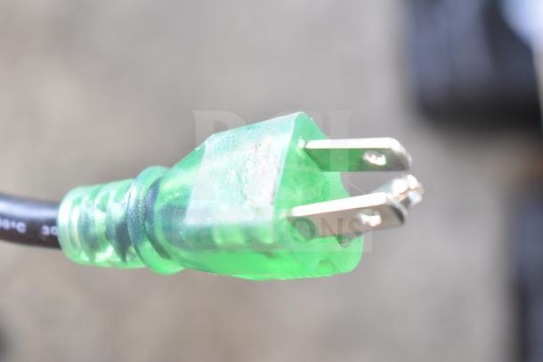 Green power plug of a Zoeller M63 sump pump, 115V, 1 phase, brand new with minor scratches, premium series.