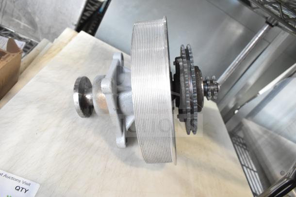 Alt text: Brand new Estella 348PSM456CLS clutch assembly for SM50 and SM60, showing minor scratches and dents.