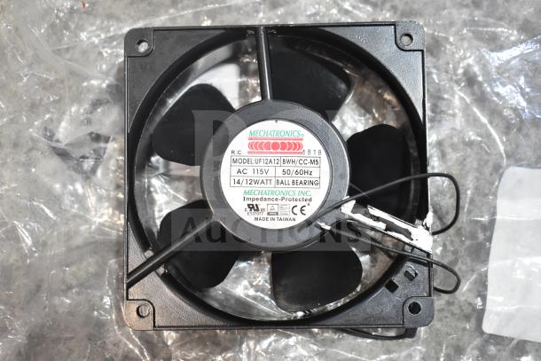 Mechatronics fan model UF12A12, 115V, 50/60Hz, 14/12W, ball bearing. Label shows specifications, made in Taiwan.
