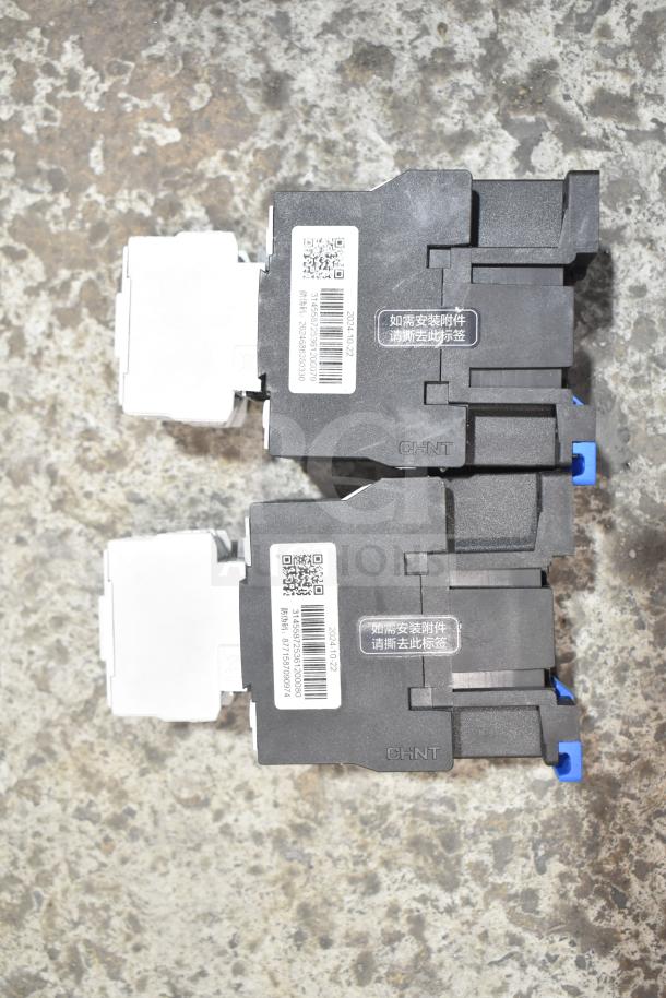Two CHNT CJX2-18 components, new, minor scratches. Visible labels include QR codes and product codes.