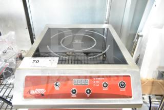Brand new Avantco 177IC3500 countertop induction range, digital display, scratch and dent, 208-240V, 1 phase, auction tag visible.