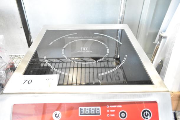 Brand new Avantco 177IC3500 countertop induction range, 208-240V, 1 Phase, with digital display and scratch-dent label.