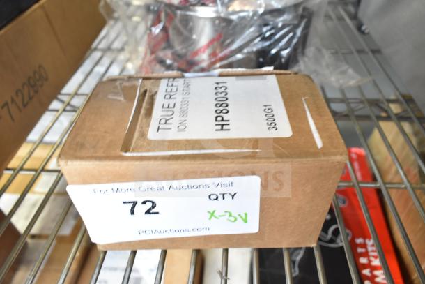 Three new scratch and dent items: Vollrath XMIX8202 switch, True 880331 start kit, Carnival King 382PM4KETTLE kettle. Box marked with quantity "X-3V."