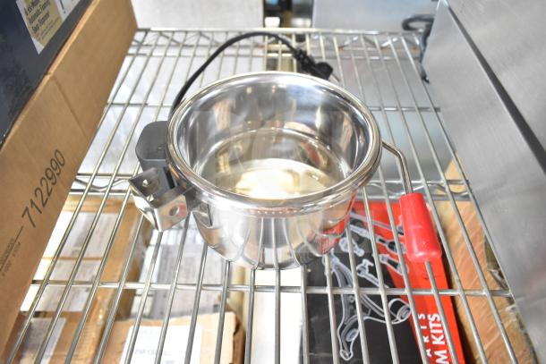 Stainless steel replacement kettle for Carnival King 382PM4KETTLE, new condition on a metal shelf.