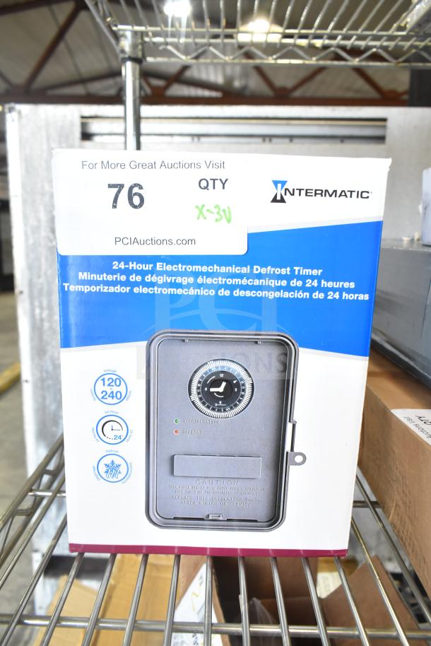 Boxed Intermatic 24-hour electromechanical defrost timer, model DTAV40, new condition with visible label indicating auction lot 76.
