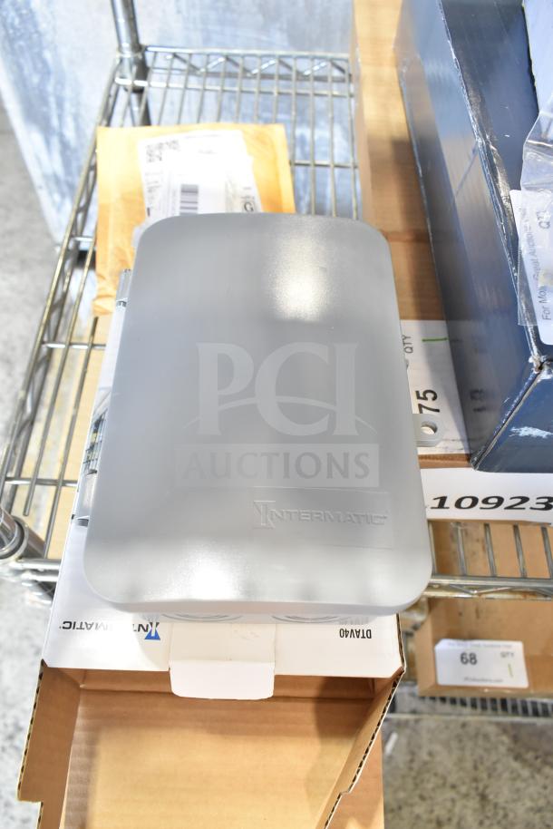 3 brand new items: Southbend 4451-1 thermostat, Heatcraft DTAV40 timer, Lancaster mid-century chair cushion in bourbon brown vinyl.